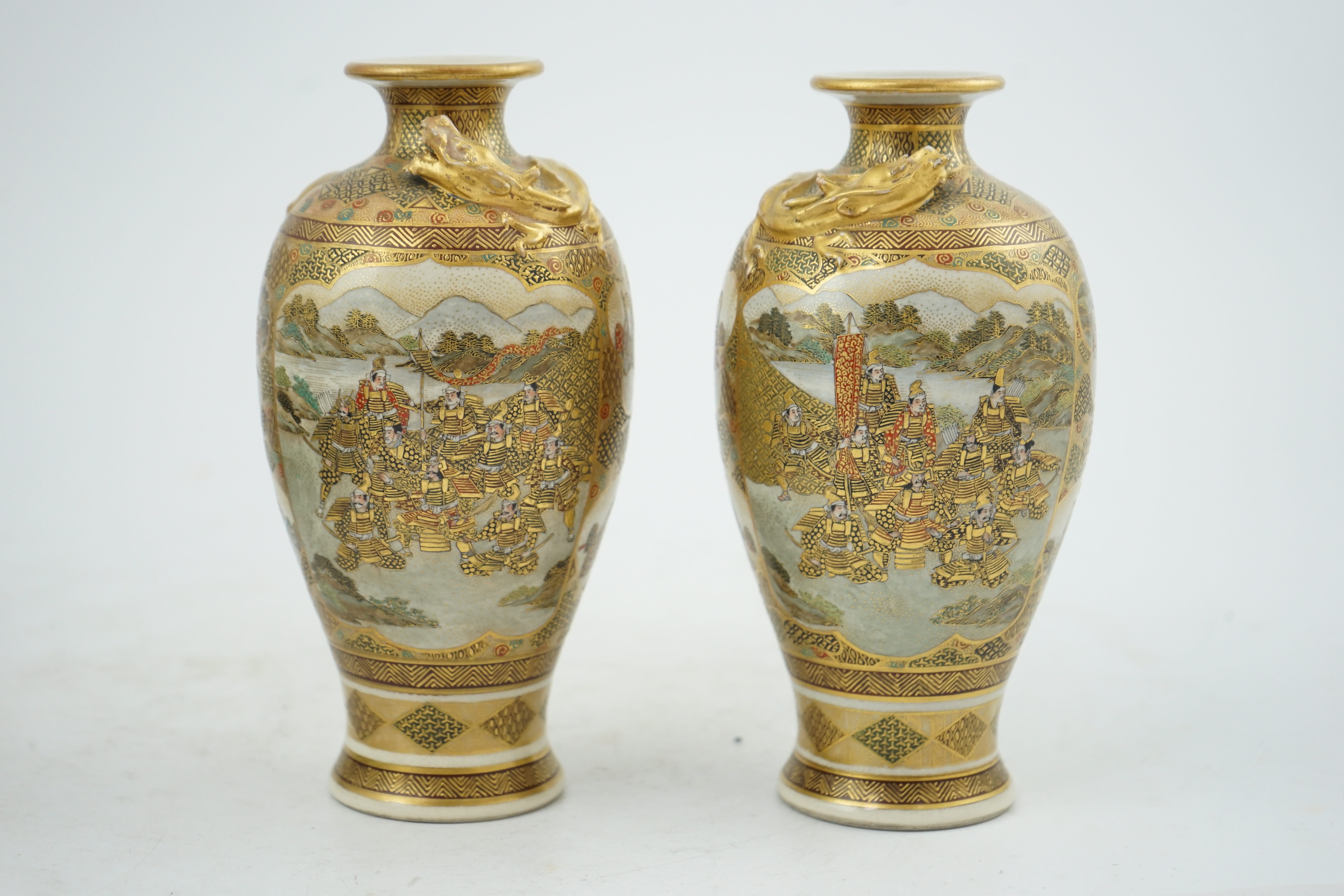 A pair of Japanese Satsuma 'dragon' vases, Meiji period